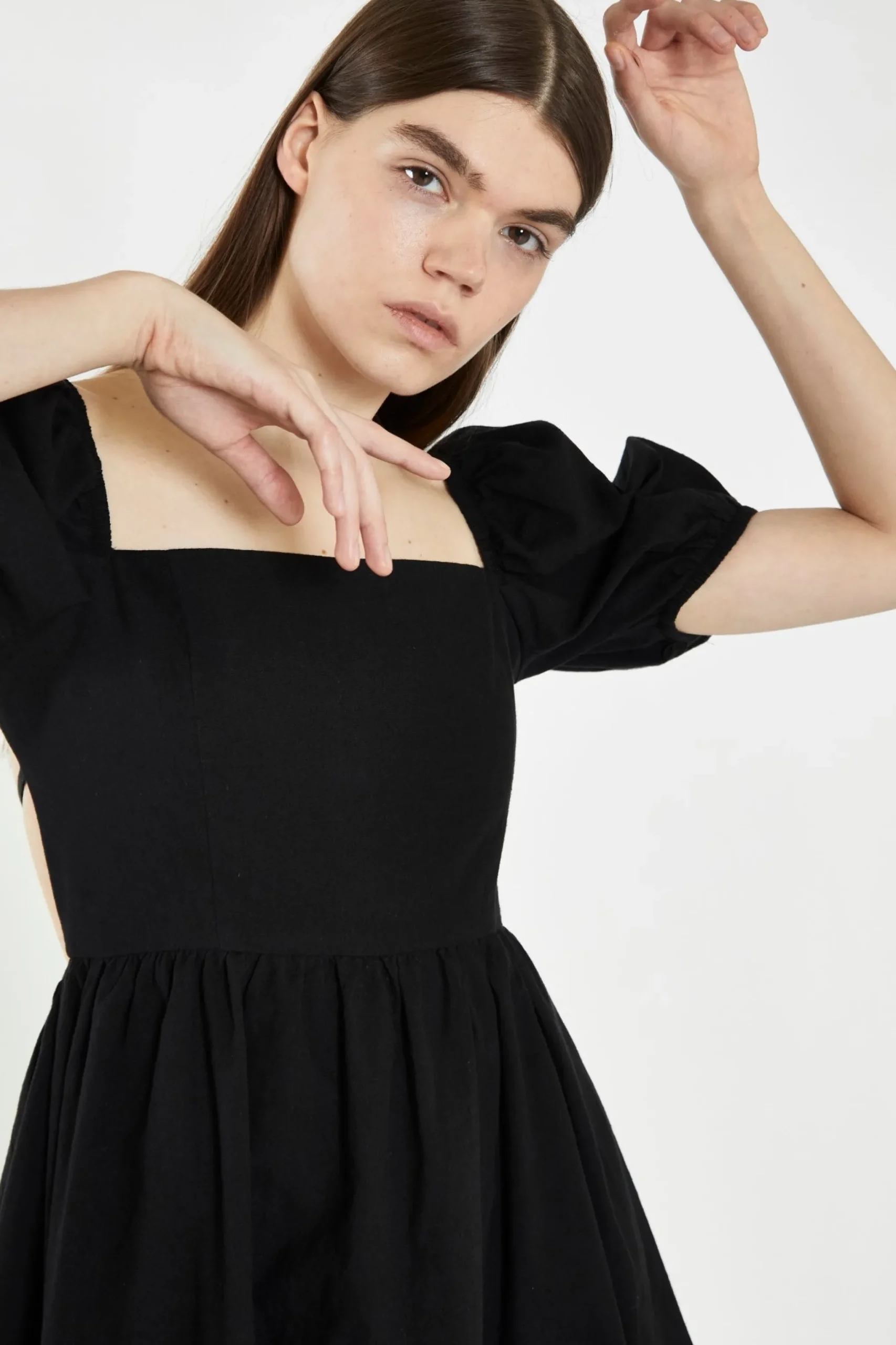 Glamorous Best Dressed Guest|Chic Escapes|Black Open-Back Babydoll Mini Dress -